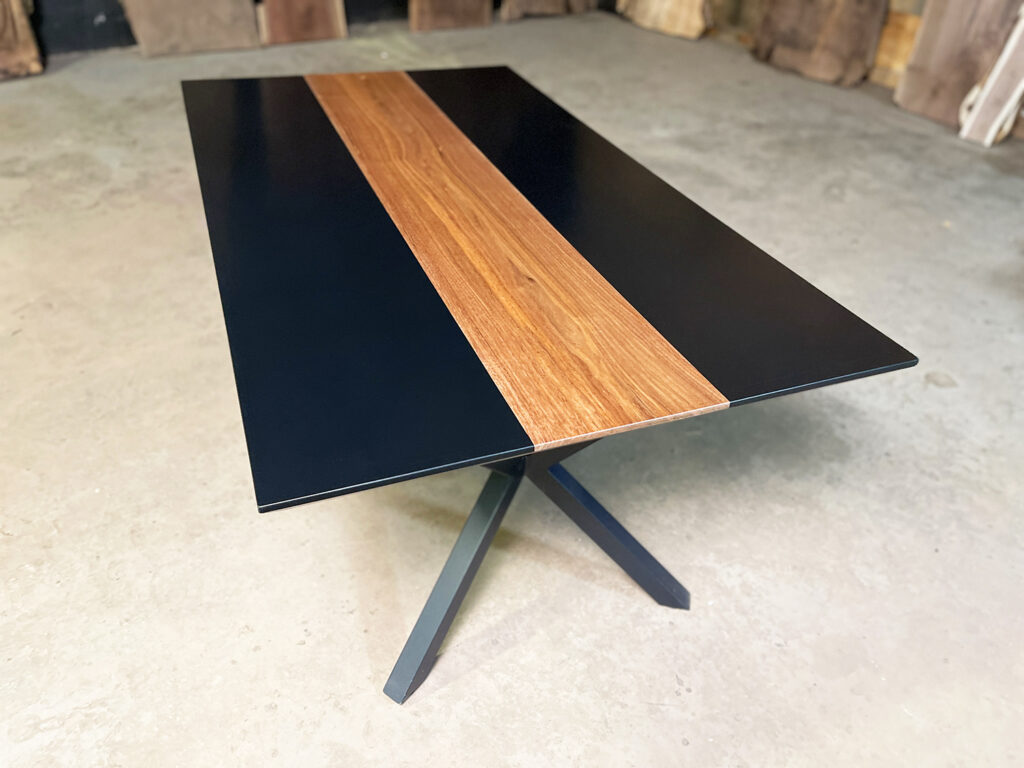 Walnut Dining Table with Solid Black Epoxy three quarters view