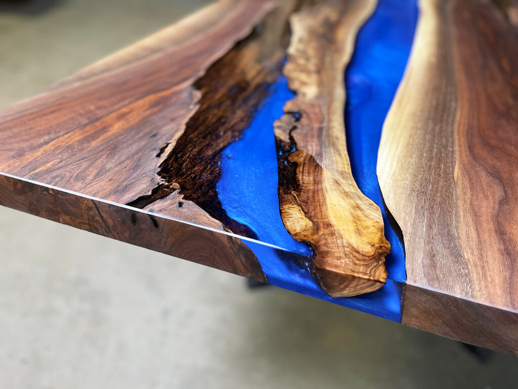 Walnut-river-dining-table-ocean-blue-clear-top-rustic-angle-wood-details-wood-epoxy