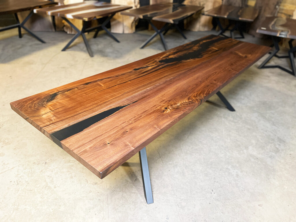 Narrow Walnut Dining Table with Solid Black Epoxy - 3/4 view