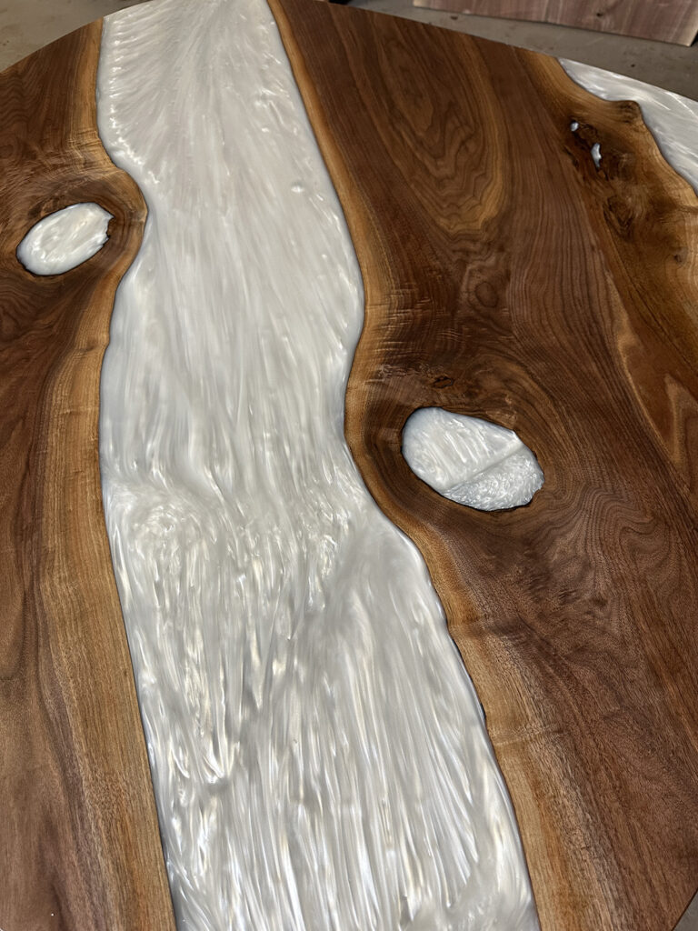 Oval Walnut Dining Table - White Metallic Epoxy Details
